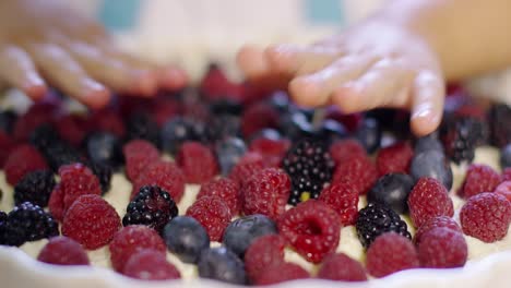 Hands-of-a-mother-and-little-daughter-baking