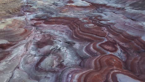 Aerial-4k-drone-fly-over-view-of-Bentonite-Hills,-Utah,-at-blue-hour