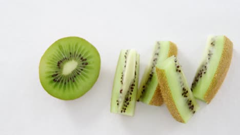 kiwi slices on white background