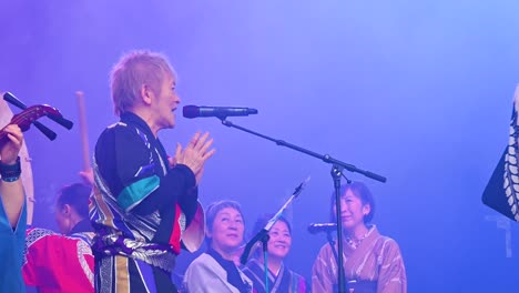japanese women's music band performing on stage