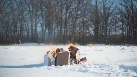 Time-lapse-garbage-burning-in-the-middle-of-a-field-in-winter