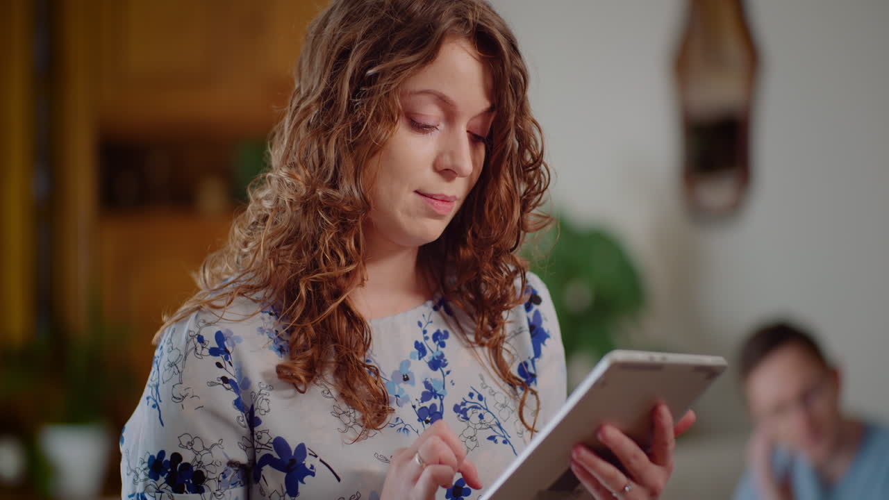 Young Smiling Successful Female Using Digital Tablet Computer Doing Online Shopping And Checking Email 1
