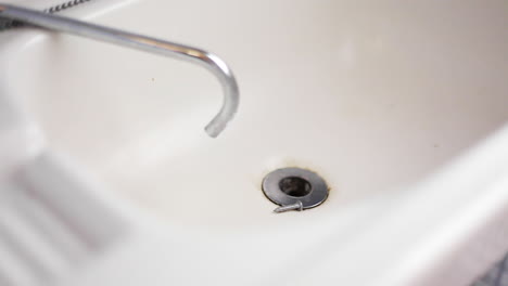 close up of abandoned sink. static