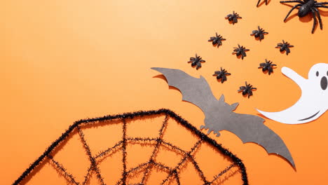animation of spiders on orange background