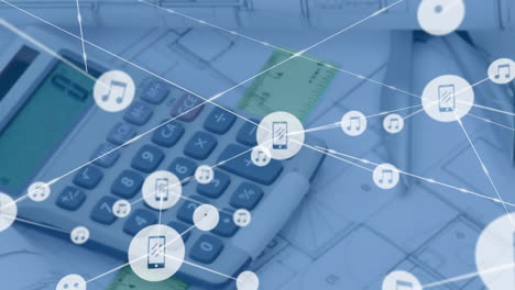 animation of network of music and media icons over calculator and blueprints on desk