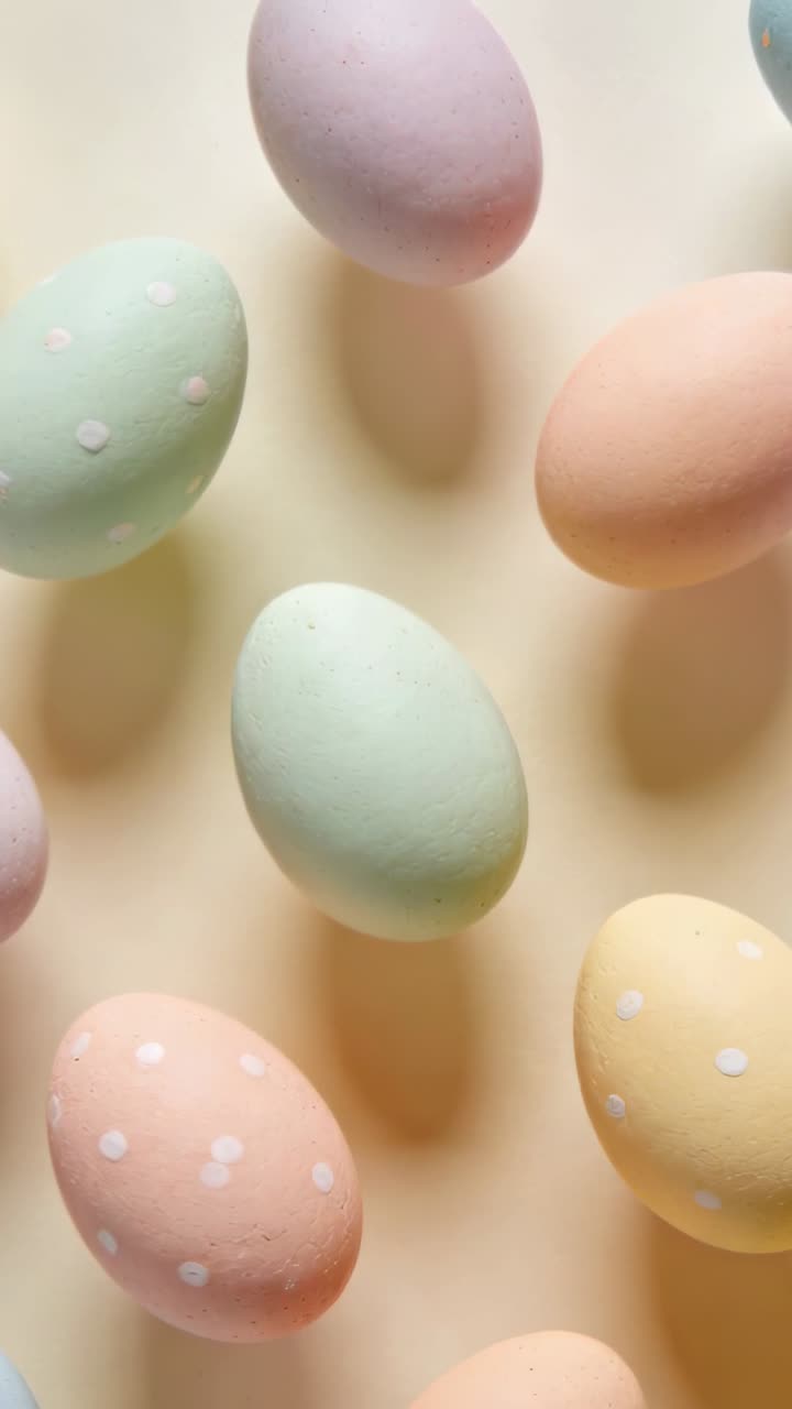 Vertical video: 5-frame shoot making pastel eggs shifting, rotating, showing soft motion for design