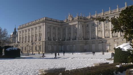 the royal palace of madrid covered in snow