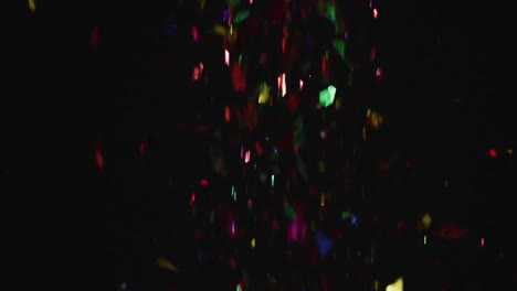 colorful confetti falling animation on dark background, creating festive atmosphere