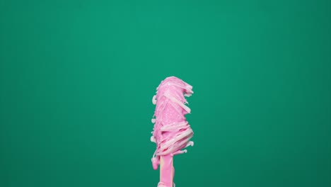 time lapse of melting ice cream on color background