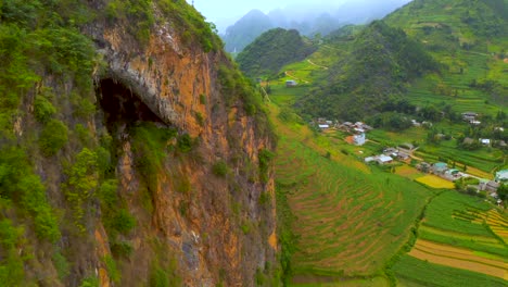 slow tilt up revealing gorgeous lush farmland in the dong van karst plateau geopark