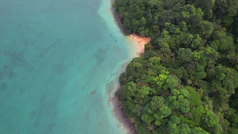 aerial view of agulhas bay and turquoise sea at the coast of ilha do principe (prince island) são tomé e principe,africa
