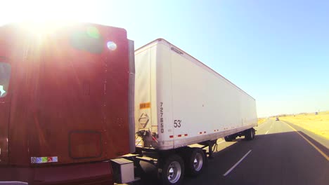 An-18-wheeler-truck-moves-across-the-desert-in-this-POV-shot-1