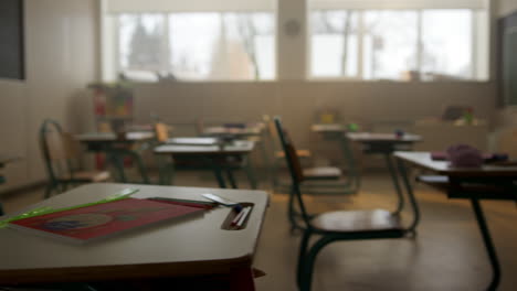 classroom with desks and chairs. interior of school room with chalkboard