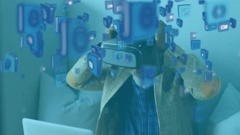 Animation of African American man wearing a vr headset over social icons floating
