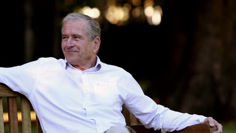 man relaxing on a park