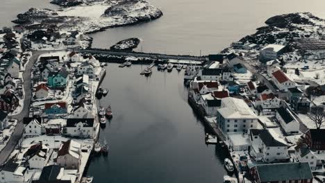henningsvaer village, dreyers gate and nearby islands in nordland, norway. - aerial shot