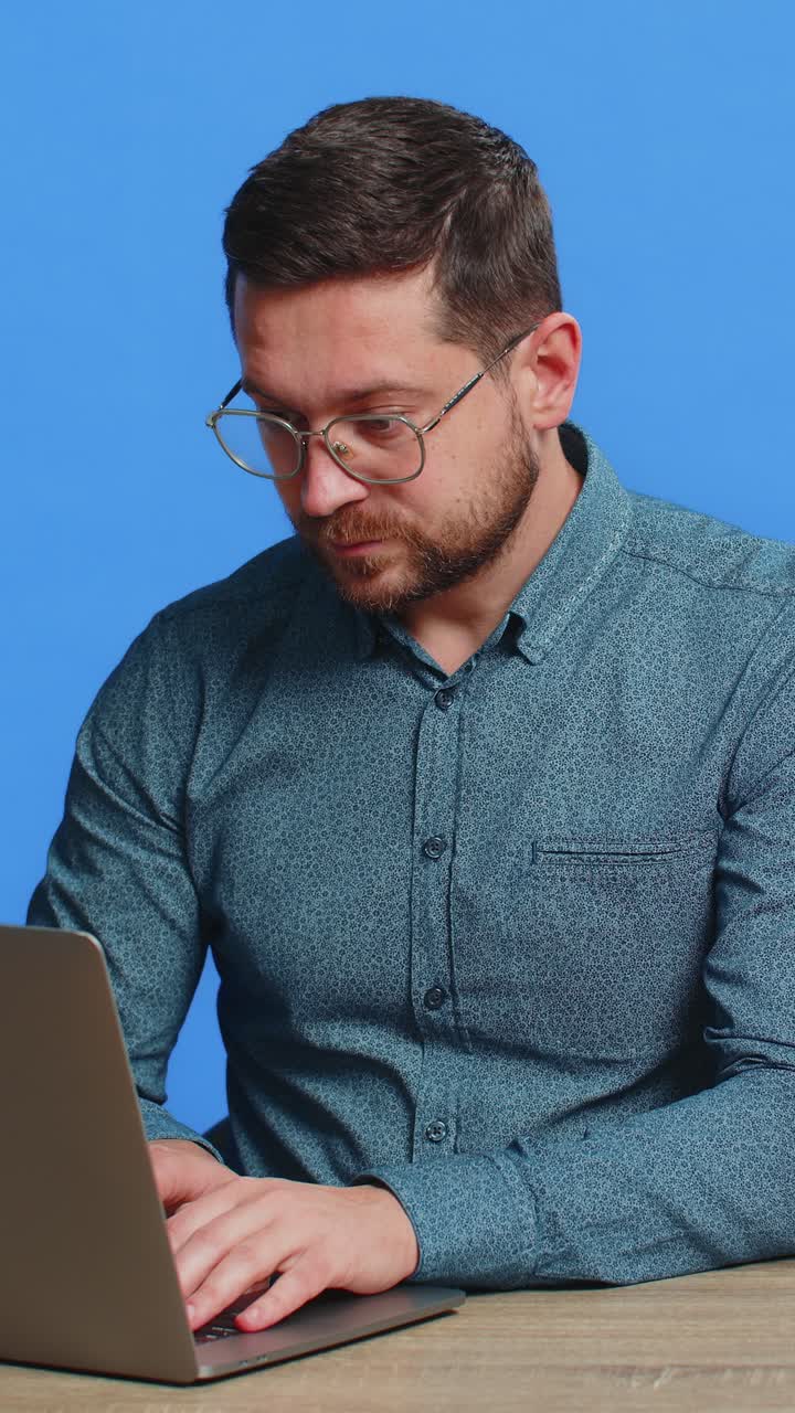 Happy man working on laptop shocked by victory celebrate winning goal achievement good career news