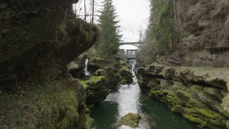 Smooth-cinematic-shot-of-Traunfall-Austria-over-smooth-water-during-summer