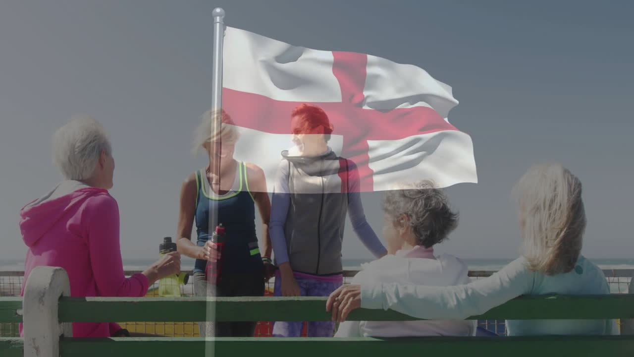 Sitting on bench, group of women with England flag animation in scene
