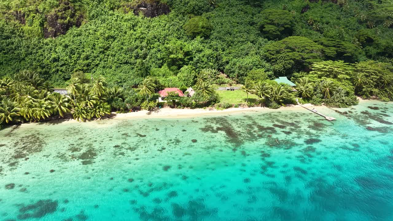 Aerial View of Huahine Island, french Polynesia. Beach and Beachfront Homes, Turquoise Sea and Green Hills