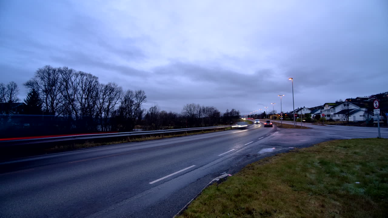 Rush Hour Traffic At Dusk In Tromso, Norway. Timelapse