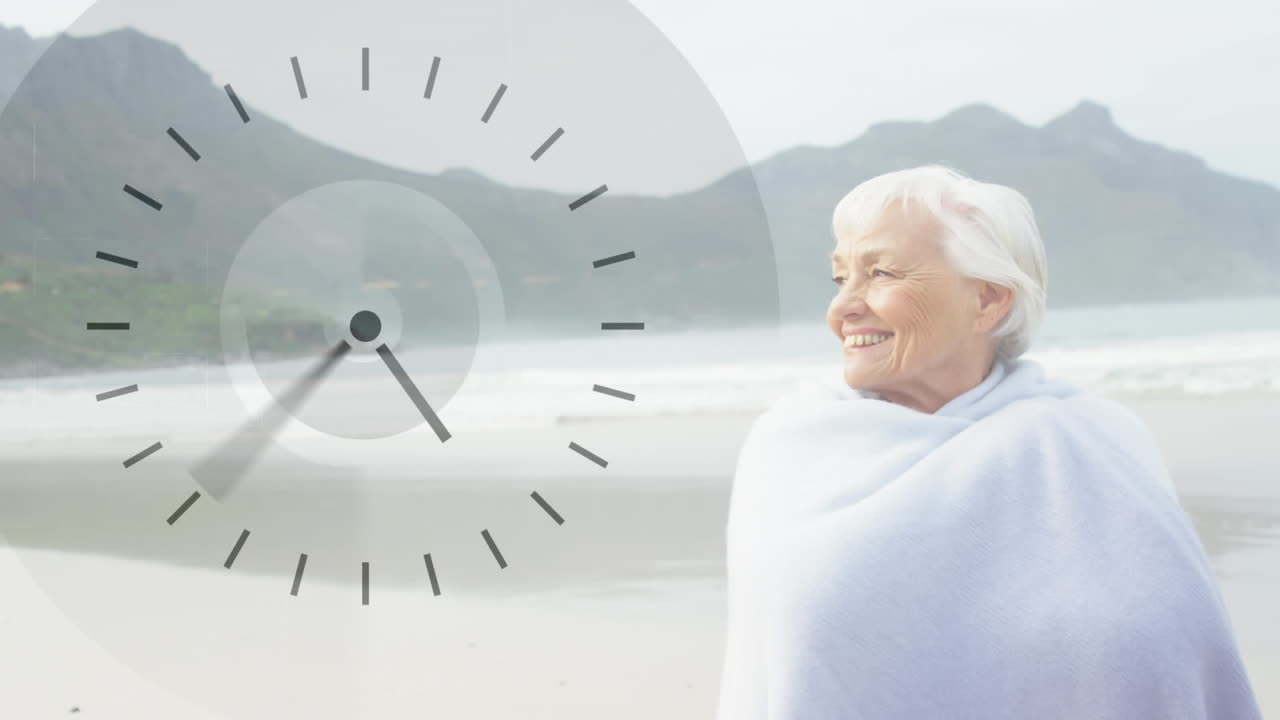 Old lady enjoying the ocean breeze