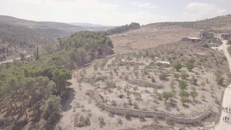 people going downhill in the outskirts of arraba palestine