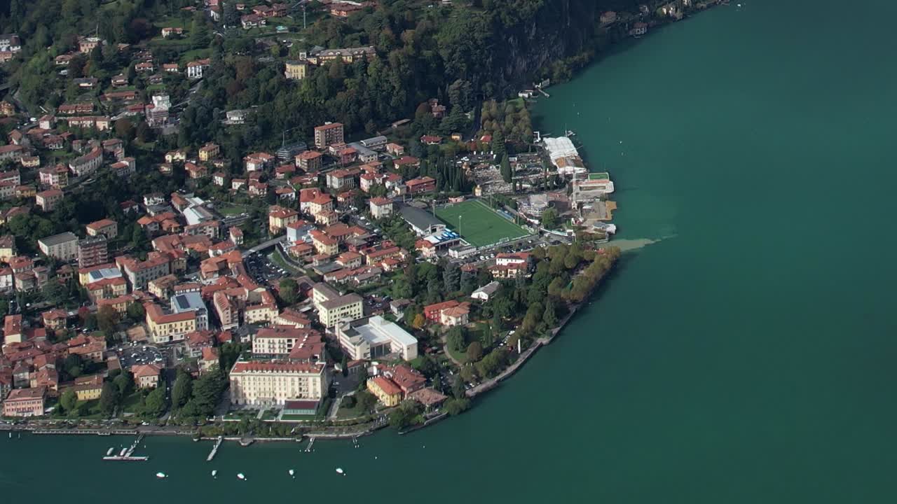 Aerial view of tranquil lakeside village in the Italian Alps