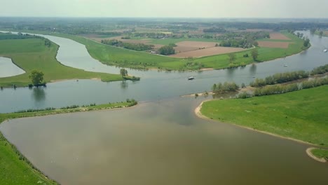 aerial drone view of the beautiful river in the netherlands, europe