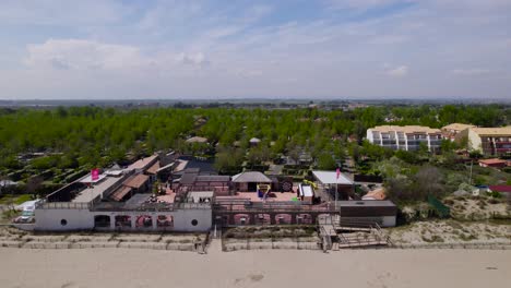 Aerial-shot-of-the-beautiful-beach-and-land-in-St-Cyprien-in-southern-france-