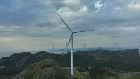 aerial view of wind turbines generating clean energy in norway.