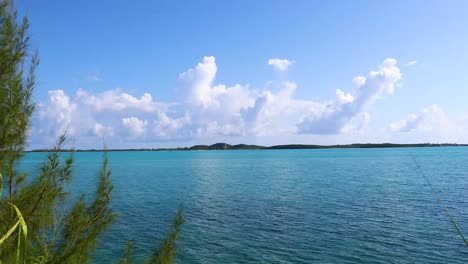 static shot of the ocean and land in the distance on exuma in the bahamas