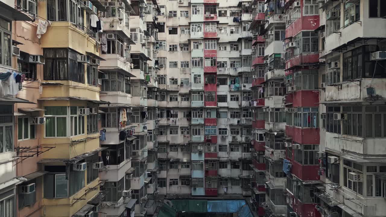 Aerial of an old apartment complex called Yick Fat on Quarry Bay, Hong Kong, China