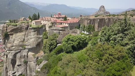 cliff top aerial flight to st stephan monastery in meteora greece