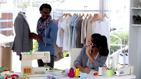 woman on the phone giving instructions to a colleague