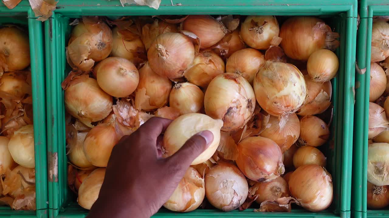 Onions in a Green Crate