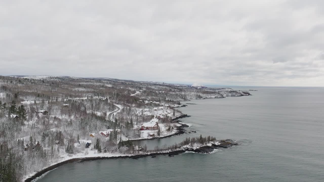 Aerial View Of Cove Point Lodge Facing Lake Superior During Winter In Minnesota, USA.