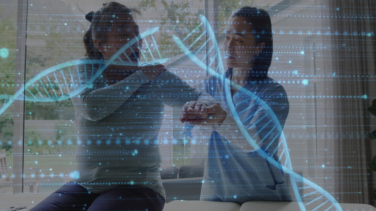 Animation of dna strand and medical data processing over diverse female physiotherapist and patient