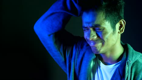 a young man experiencing distress