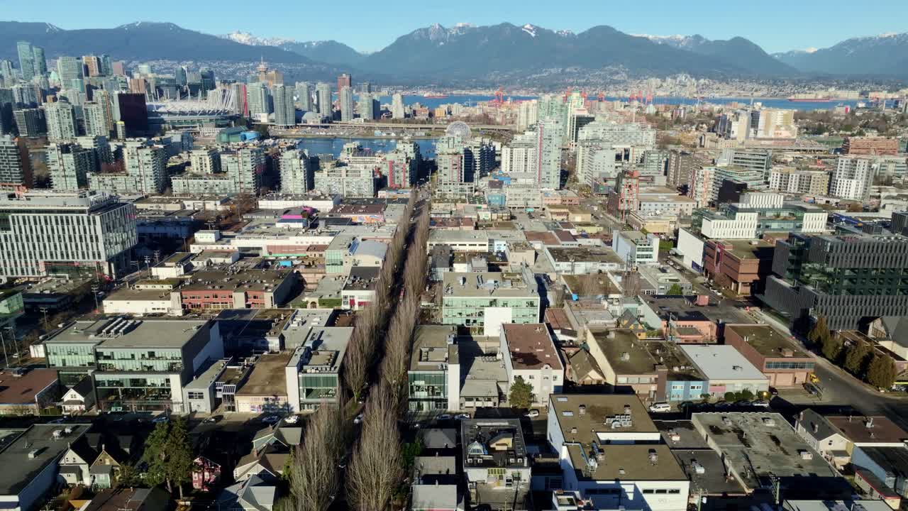 Revealing Shot Of Downtown Vancouver From Fairview Neighbourhood In Vancouver, BC, Canada. aerial tilt-up descend