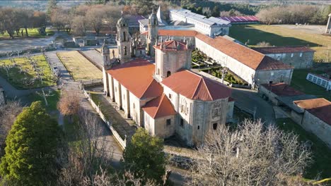 Backside-to-side-view-of-religious-sanctuary-with-stunning-bell-tower-and-courtyard-in-Ourense-Spain