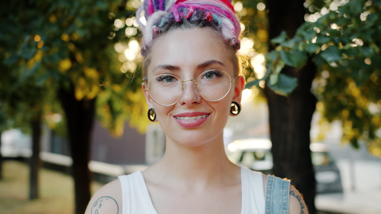 Woman with Dreadlocks and Glasses