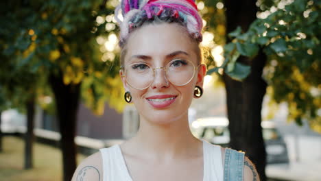 woman with dreadlocks and glasses