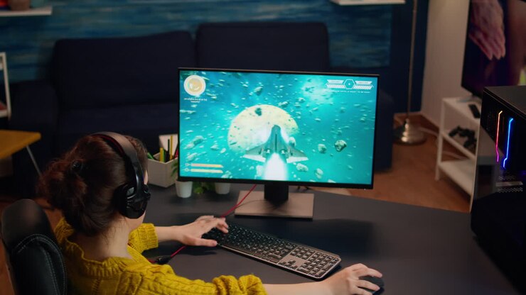 Gamer konkurrerer i et videospil på et mesterskabsevent