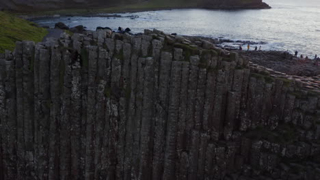 aerial top-down view of basalt columns at giant's causeway with sunset reveal