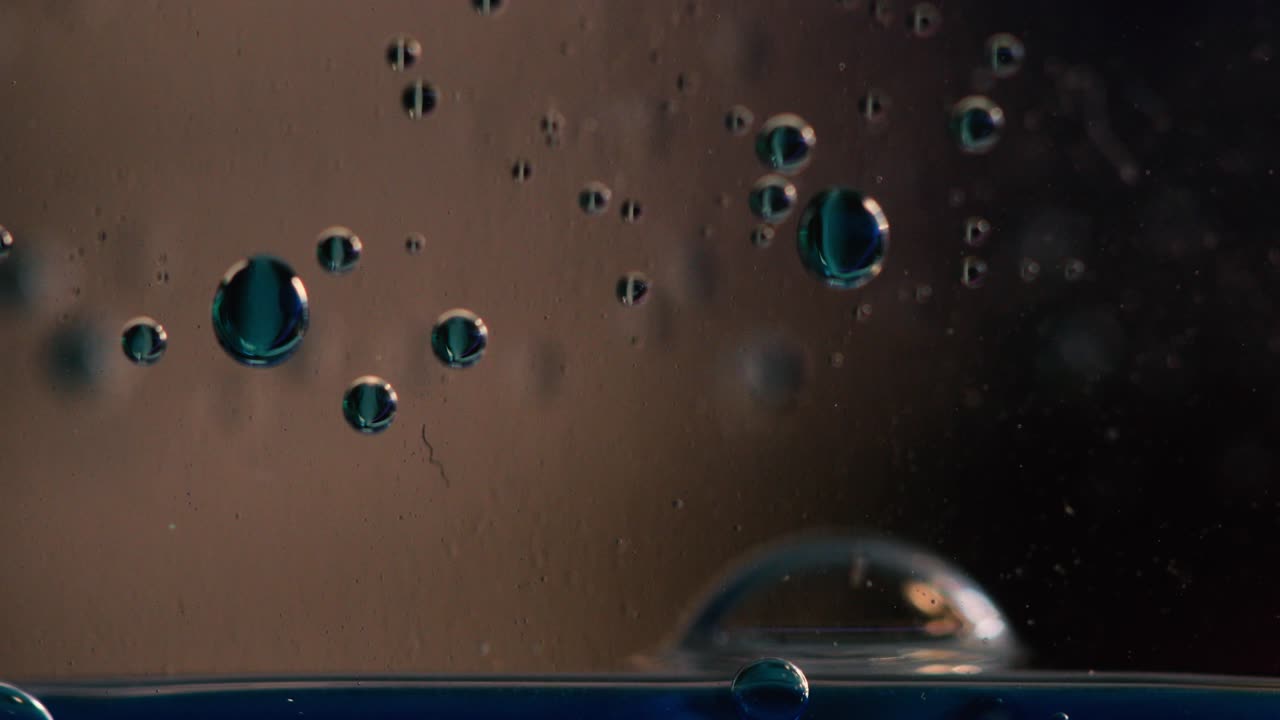 Blue Liquid Draining Macro