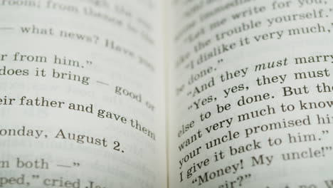 close-up of book pages with text