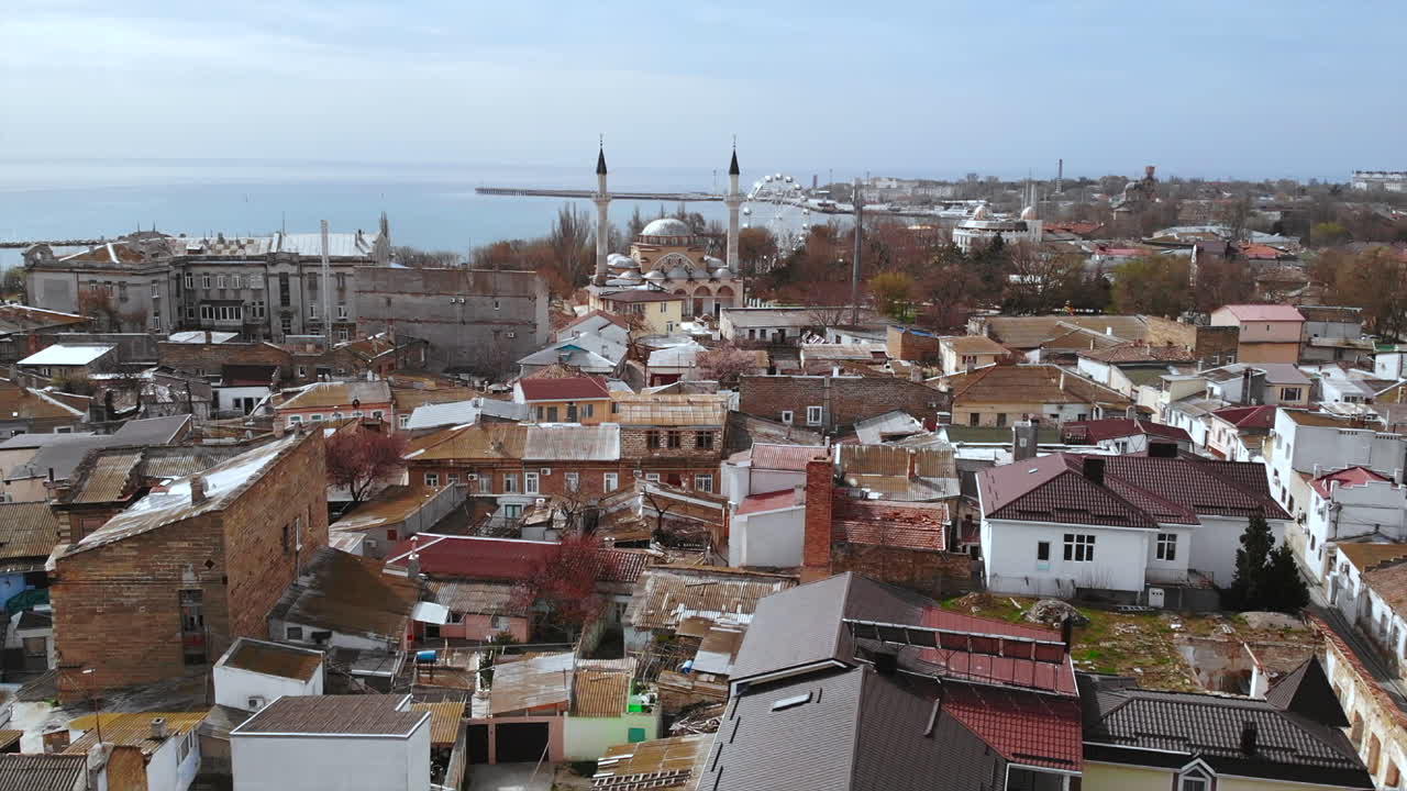 Cityscape with Mosque and Sea View