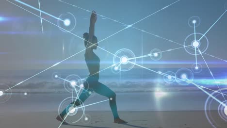 animation of networks of connections over caucasian woman praciticing yoga on beach