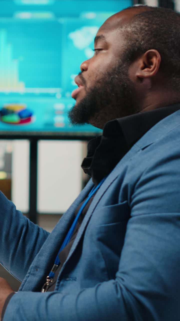 Vertical Video Black analyst meeting on online video call with associates to discuss insights